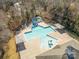 Aerial view of the community pool featuring a slide and a separate kiddie pool area for Gathering-friendly fun at 1806 Grayscroft Dr, Waxhaw, NC 28173