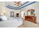 Spacious main bedroom featuring a tray ceiling, carpet floors, and ample natural light at 1806 Grayscroft Dr, Waxhaw, NC 28173