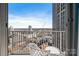 Balcony showcasing stunning city views, perfect for relaxing or entertaining while enjoying the urban landscape at 210 N Church St # 2411, Charlotte, NC 28202