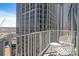 Urban balcony featuring two chairs and city views at 210 N Church St # 2411, Charlotte, NC 28202