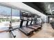 Bright gym with treadmills, rowing machine, and large windows offering outside views at 210 N Church St # 2411, Charlotte, NC 28202