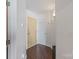 A clean and tidy hallway shows the passage into the home at 210 N Church St # 2411, Charlotte, NC 28202