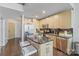 Modern kitchen with stainless steel appliances and large island at 210 N Church St # 2411, Charlotte, NC 28202