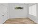 Bright bedroom with hardwood floors, recessed lighting, and double door closet at 2100 St Paul St, Charlotte, NC 28216