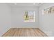 Bright bedroom with hardwood floors, recessed lighting, and natural light at 2100 St Paul St, Charlotte, NC 28216