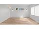 Bright bedroom with wood floors, natural light, and modern lighting at 2100 St Paul St, Charlotte, NC 28216