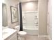 Clean bathroom with shower/tub combo and neutral decor at 21087 Cadence Trace Dr, Mint Hill, NC 28227