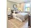 Spacious bedroom with king-size bed and neutral decor at 21087 Cadence Trace Dr, Mint Hill, NC 28227