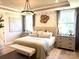 Main bedroom with a neutral color palette and en-suite bathroom at 21087 Cadence Trace Dr, Mint Hill, NC 28227