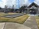 Community bocce ball court with homes in the background at 21087 Cadence Trace Dr, Mint Hill, NC 28227