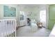 Charming Bedroom with a crib, armchair, and plenty of natural light at 2121 Winter St, Charlotte, NC 28205