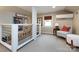 Cozy loft area with a comfortable chair and built-in bookshelves at 2121 Winter St, Charlotte, NC 28205