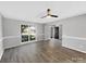 Living room with hardwood floors and a view of the front yard at 2139 Mallard Green Pl, Charlotte, NC 28262