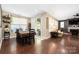 Inviting dining area with hardwood floors, slider door, and natural light at 223 Blossom Ridge Dr # 137, Mooresville, NC 28117