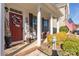 Cozy front porch adorned with decorative wreath and American flag at 223 Blossom Ridge Dr # 137, Mooresville, NC 28117