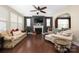 Inviting living room featuring a cozy fireplace and ample seating at 223 Blossom Ridge Dr # 137, Mooresville, NC 28117