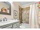 Well-maintained bathroom featuring a shower-tub combo, a modern vanity, and neutral tones at 2710 Redbud Ln, Fort Mill, SC 29715