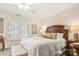 Serene main bedroom with shuttered windows and elegant furniture at 2710 Redbud Ln, Fort Mill, SC 29715