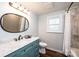 Bathroom with a vanity with marble countertop, a decorative mirror, and shower at 2745 33Rd Ne Ave, Hickory, NC 28601