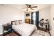 Bedroom featuring hardwood floors, a ceiling fan, an area rug, and drumset at 2745 33Rd Ne Ave, Hickory, NC 28601