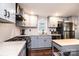 Well-lit kitchen featuring gray cabinets, stainless steel appliances, and durable granite countertops at 2745 33Rd Ne Ave, Hickory, NC 28601