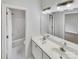 Bathroom with double sinks and a shower/tub combo at 3013 Tiffany Dr, Monroe, NC 28110