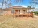 Spacious deck with a covered patio area, perfect for entertaining at 3013 Tiffany Dr, Monroe, NC 28110