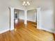 Formal dining room with hardwood floors and white columns at 3013 Tiffany Dr, Monroe, NC 28110