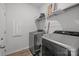 Laundry room with washer, dryer, and overhead shelving at 3089 Virginia Trail Ct, Fort Mill, SC 29715