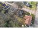 An aerial view showing the property and surrounding neighborhood with mature trees and proximity to the street at 309 Lloyd St, Salisbury, NC 28144