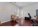 Bedroom featuring hardwood floors, neutral paint, and a window at 309 Lloyd St, Salisbury, NC 28144