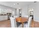 Kitchen featuring stainless steel appliances, white cabinets, granite countertops and access to adjacent rooms at 309 Lloyd St, Salisbury, NC 28144