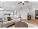 Bright living space featuring ceiling fan and hardwood floors at 309 Lloyd St, Salisbury, NC 28144