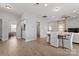 Wide angle shot of open concept floorplan showcasing dining, living, and access to bathroom and laundry at 309 Lloyd St, Salisbury, NC 28144