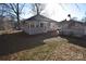 Small backyard with shed and leaf covered lawn at 315 S Hill St, Gastonia, NC 28052