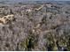 Birds-eye perspective of a home surrounded by trees, highlighting its peaceful and nature-filled environment at 3609 Shillinglaw Rd, Sharon, SC 29742