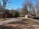 Home exterior featuring a detached carport and large yard with mature trees offering a glimpse of nature at 3609 Shillinglaw Rd, Sharon, SC 29742