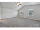 Spacious bedroom with carpeted floors and two windows at 3915 Allenby Pl, Monroe, NC 28110