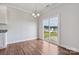 Bright dining area with sliding glass doors leading to backyard at 3915 Allenby Pl, Monroe, NC 28110