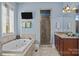 Bathroom with jacuzzi tub, glass shower, and and vanity at 4008 Quintessa Dr, Matthews, NC 28104