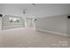 Large bonus room features dormer windows, neutral carpet, ceiling fan, and recessed lighting at 4008 Quintessa Dr, Matthews, NC 28104
