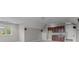 Spacious bonus room with ceiling fan, cabinets, neutral paint, and natural light at 4008 Quintessa Dr, Matthews, NC 28104