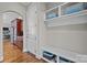 Hallway entry with built in bench, shelving, and coat closet for storage at 4008 Quintessa Dr, Matthews, NC 28104