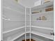 Organized pantry with ample shelving, providing plenty of storage space for groceries and kitchen essentials at 4008 Quintessa Dr, Matthews, NC 28104