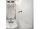 Modern half bathroom featuring a vessel sink, black hardware, and minimalist design at 4605 Western Union School Rd, Waxhaw, NC 28173