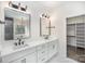 A well-lit bathroom with dual sinks, modern fixtures, and a bright, clean aesthetic at 4605 Western Union School Rd, Waxhaw, NC 28173