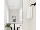 Clean bathroom with a modern mirror, sleek black hardware, and a white sink at 4605 Western Union School Rd, Waxhaw, NC 28173