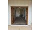 Inviting entryway with double wood doors and views into the living area featuring attractive floors and neutral walls at 4605 Western Union School Rd, Waxhaw, NC 28173