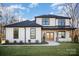 This two-story modern farmhouse features a classic design and inviting curb appeal at 4605 Western Union School Rd, Waxhaw, NC 28173