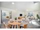Open-concept living room featuring modern decor, a dining area, and comfortable seating at 4605 Western Union School Rd, Waxhaw, NC 28173